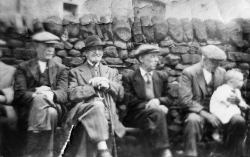 Concrete seat.jpg - Old Long Prestonians on the seat by the Concrete - 1953  From left to right:  Jack Martin (railwayman - at cattle dock) - B.Stone (mason) - H.Throup (painter) - H.Wilson (blacksmith) Baby is thought to be Hilary Bicknell
